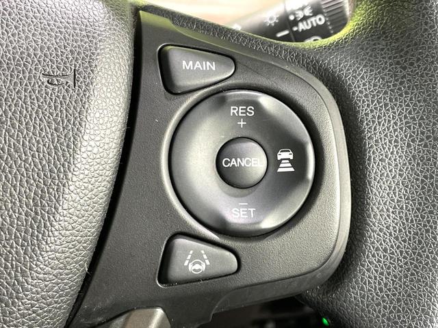 フリードハイブリッド ハイブリッド・Gホンダセンシング 禁煙車 両側電動スライドドア 純正ナビ ホンダセンシング アダプティブクルーズ フルセグTV バックカメラ シートヒーター ETC ドラレコ Bluetooth接続 LEDヘッド オートエアコン(6枚目)