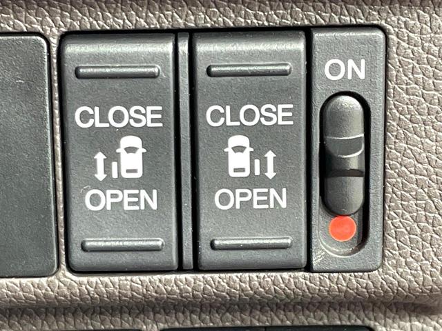 フリードハイブリッド ハイブリッド・Gホンダセンシング 禁煙車 両側電動スライドドア 純正ナビ ホンダセンシング アダプティブクルーズ フルセグTV バックカメラ シートヒーター ETC ドラレコ Bluetooth接続 LEDヘッド オートエアコン(7枚目)