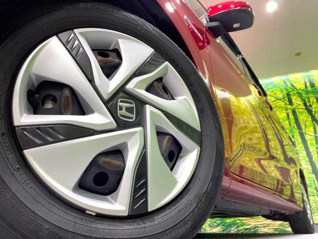 フリードハイブリッド ハイブリッド・Gホンダセンシング 禁煙車 両側電動スライドドア 純正ナビ ホンダセンシング アダプティブクルーズ フルセグTV バックカメラ シートヒーター ETC ドラレコ Bluetooth接続 LEDヘッド オートエアコン(14枚目)