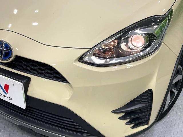 アクア クロスオーバー　純正ナビ　バックカメラ　禁煙車　セーフティセンス　車線逸脱警報　オートマチックハイビーム　クルーズコントロール　ハーフレザー　ドラレコ　フルセグ　Ｂｌｕｅｔｏｏｔｈ再生　ＥＴＣ　純正１６インチアルミ（12枚目）