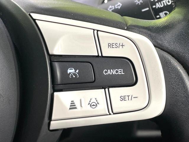 フィット ｅ：ＨＥＶホーム　禁煙車　純正９インチナビ　ホンダセンシング　アダプティブクルーズ　ＥＴＣ　Ｂｌｕｅｔｏｏｔｈ接続　ドラレコ　スマートキー　ハーフレザーシート　ＬＥＤヘッド　コーナーセンサー　オートライト（6枚目）