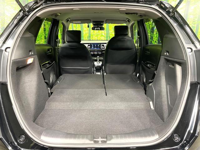 フィット ｅ：ＨＥＶホーム　禁煙車　純正９インチナビ　ホンダセンシング　アダプティブクルーズ　ＥＴＣ　Ｂｌｕｅｔｏｏｔｈ接続　ドラレコ　スマートキー　ハーフレザーシート　ＬＥＤヘッド　コーナーセンサー　オートライト（10枚目）