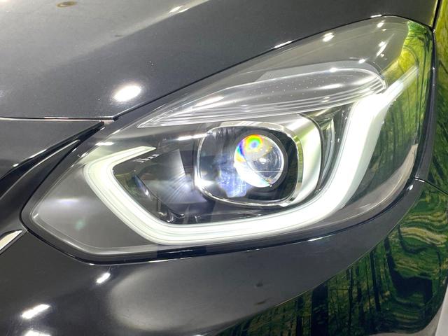 フィット ｅ：ＨＥＶホーム　禁煙車　純正９インチナビ　ホンダセンシング　アダプティブクルーズ　ＥＴＣ　Ｂｌｕｅｔｏｏｔｈ接続　ドラレコ　スマートキー　ハーフレザーシート　ＬＥＤヘッド　コーナーセンサー　オートライト（12枚目）