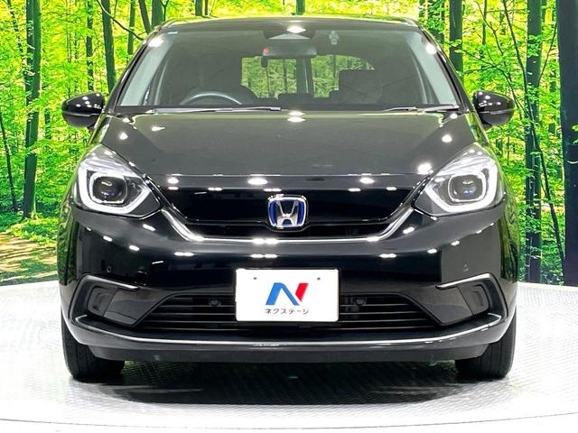 フィット ｅ：ＨＥＶホーム　禁煙車　純正９インチナビ　ホンダセンシング　アダプティブクルーズ　ＥＴＣ　Ｂｌｕｅｔｏｏｔｈ接続　ドラレコ　スマートキー　ハーフレザーシート　ＬＥＤヘッド　コーナーセンサー　オートライト（14枚目）