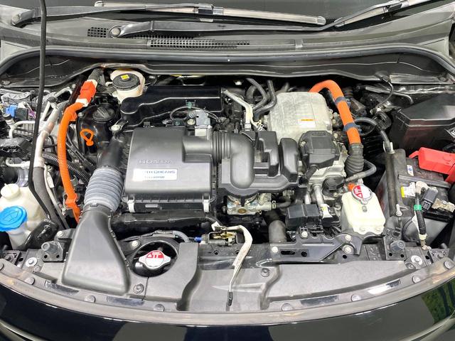 フィット ｅ：ＨＥＶホーム　禁煙車　純正９インチナビ　ホンダセンシング　アダプティブクルーズ　ＥＴＣ　Ｂｌｕｅｔｏｏｔｈ接続　ドラレコ　スマートキー　ハーフレザーシート　ＬＥＤヘッド　コーナーセンサー　オートライト（18枚目）