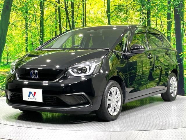 フィット ｅ：ＨＥＶホーム　禁煙車　純正９インチナビ　ホンダセンシング　アダプティブクルーズ　ＥＴＣ　Ｂｌｕｅｔｏｏｔｈ接続　ドラレコ　スマートキー　ハーフレザーシート　ＬＥＤヘッド　コーナーセンサー　オートライト（24枚目）