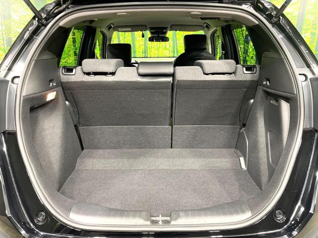 フィット ｅ：ＨＥＶホーム　禁煙車　純正９インチナビ　ホンダセンシング　アダプティブクルーズ　ＥＴＣ　Ｂｌｕｅｔｏｏｔｈ接続　ドラレコ　スマートキー　ハーフレザーシート　ＬＥＤヘッド　コーナーセンサー　オートライト（28枚目）
