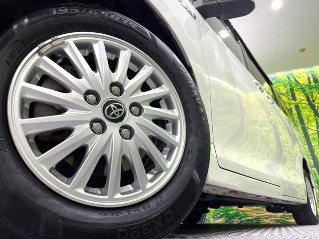 ヴォクシー ハイブリッドＶ　禁煙車　ナビ　両側電動ドア　後席モニター　バックカメラ　ドラレコ　スマートキー　ＬＥＤヘッド　ＥＴＣ　純正１６インチアルミ　オートエアコン　リアエアコン　Ｂｌｕｅｔｏｏｔｈ　ＣＤ　ＤＶＤ再生　地デジ（14枚目）