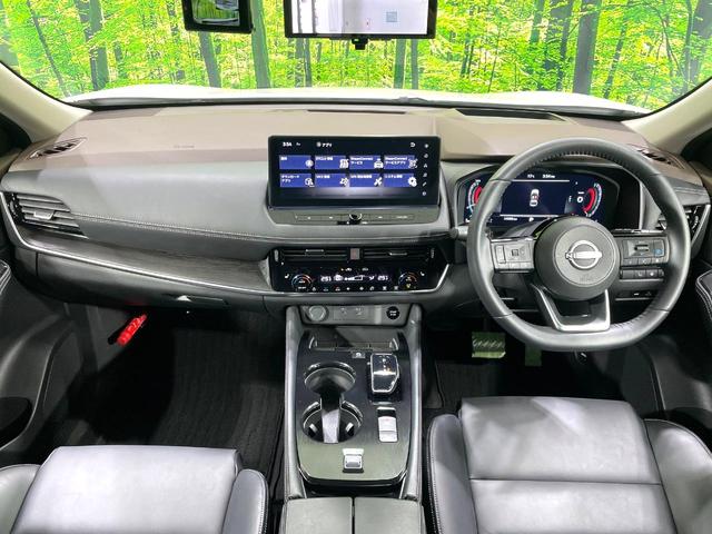 エクストレイル Ｇ　禁煙車　純正１２．３型ナビ　全周囲カメラ　プロパイロット　２トーンカラー　エマージェンシーブレーキ　ＥＴＣ２．０　ドラレコ　シートヒーター　パワーバックドア　パワーシート　ＬＥＤヘッド／フォグライト（2枚目）