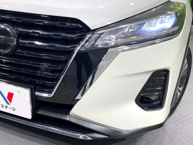 キックス Ｘ　ツートーンインテリアエディション　純正９型ナビ　全周囲カメラ　禁煙車　衝突軽減装置　プロパイロット　デジタルインナーミラー　ＬＥＤヘッド／フォグ　ドラレコ　フルセグ　Ｂｌｕｅｔｏｏｔｈ再生　ＥＴＣ　シート／ハンドルヒーター（14枚目）