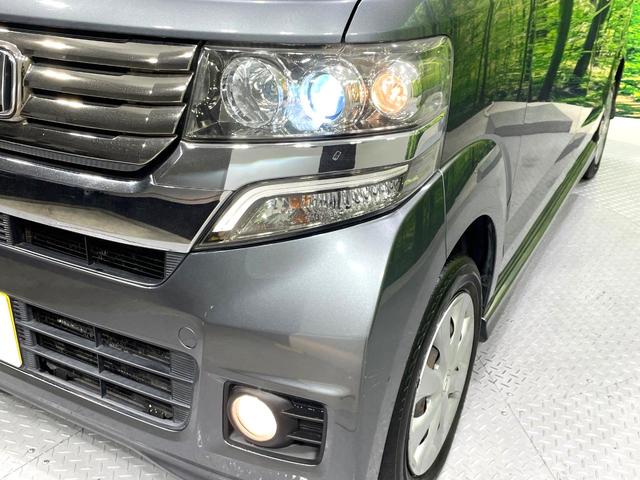 N-BOXカスタム G SDナビ 禁煙車 スマートキー HIDヘッド アイドリングストップ ETC オートライト/エアコン 横滑り防止装置 盗難防止システム 電動格納ミラー(13枚目)