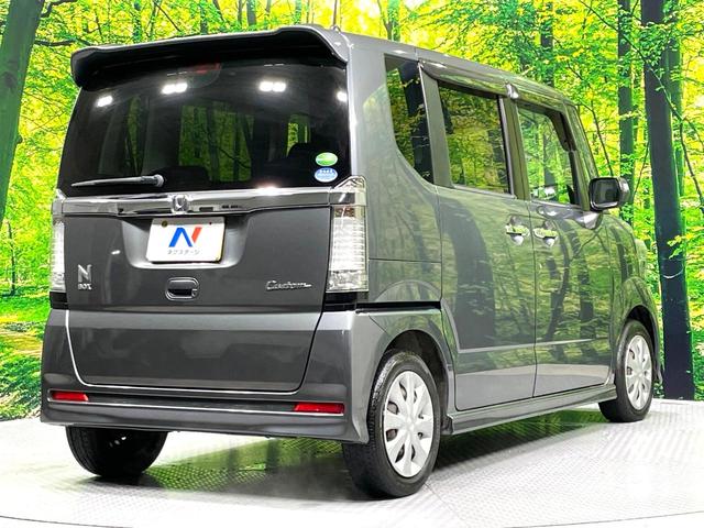 N-BOXカスタム G SDナビ 禁煙車 スマートキー HIDヘッド アイドリングストップ ETC オートライト/エアコン 横滑り防止装置 盗難防止システム 電動格納ミラー(25枚目)
