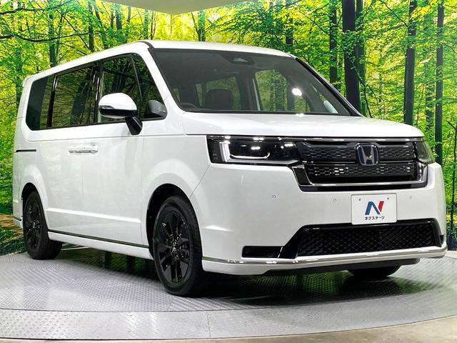 ステップワゴン ｅ：ＨＥＶスパーダ　登録済未使用車　両側電動ドア　ホンダセンシング　アダプティブクルーズ　ブラインドスポットモニター　シートヒーター　電動リアゲート　ＬＥＤヘッド／フォグ　ハーフレザー　クリアランスソナー　スマートキー（65枚目）