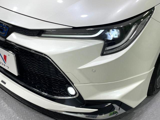 カローラツーリング ハイブリッド　ダブルバイビー　モデリスタエアロ　純正９型ディスプレイ　バックカメラ　禁煙車　セーフティセンス　レーダークルーズ　ＬＥＤヘッド／フォグ　ハーフレザー　ドラレコ　Ｂｌｕｅｔｏｏｔｈ再生　ＥＴＣ　スマートキー（14枚目）