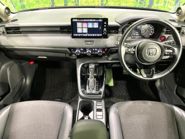 ヴェゼル ｅ：ＨＥＶ　Ｚ　純正９型ナビ　全周囲カメラ　禁煙車　ホンダセンシング　アダプティブクルーズ　ブラインドスポットモニター　ＬＥＤヘッド／フォグ　ハーフレザー　シートヒーター　フルセグ　Ｂｌｕｅｔｏｏｔｈ再生　ＥＴＣ（2枚目）