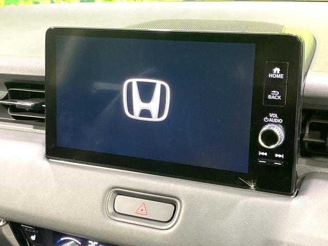 ヴェゼル ｅ：ＨＥＶ　Ｚ　純正９型ナビ　全周囲カメラ　禁煙車　ホンダセンシング　アダプティブクルーズ　ブラインドスポットモニター　ＬＥＤヘッド／フォグ　ハーフレザー　シートヒーター　フルセグ　Ｂｌｕｅｔｏｏｔｈ再生　ＥＴＣ（3枚目）