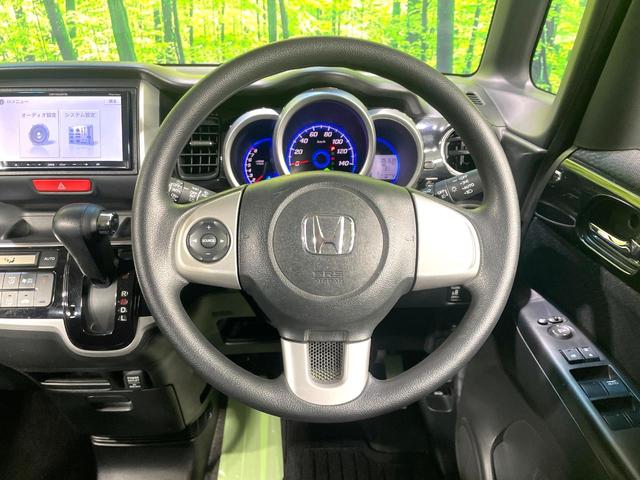 Ｎ－ＢＯＸカスタム Ｇ・Ｌパッケージ　禁煙車　ＳＤナビ　パワースライドドア　ＨＩＤヘッド　オートライト／エアコン　スマートキー　アイドリングストップ　純正１４インチアルミ　電動格納ミラー　横滑り防止装置　盗難防止システム（12枚目）