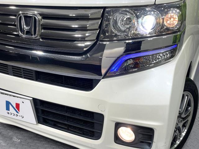 Ｎ－ＢＯＸカスタム Ｇ・Ｌパッケージ　禁煙車　ＳＤナビ　パワースライドドア　ＨＩＤヘッド　オートライト／エアコン　スマートキー　アイドリングストップ　純正１４インチアルミ　電動格納ミラー　横滑り防止装置　盗難防止システム（13枚目）