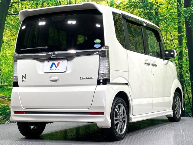 Ｎ－ＢＯＸカスタム Ｇ・Ｌパッケージ　禁煙車　ＳＤナビ　パワースライドドア　ＨＩＤヘッド　オートライト／エアコン　スマートキー　アイドリングストップ　純正１４インチアルミ　電動格納ミラー　横滑り防止装置　盗難防止システム（32枚目）