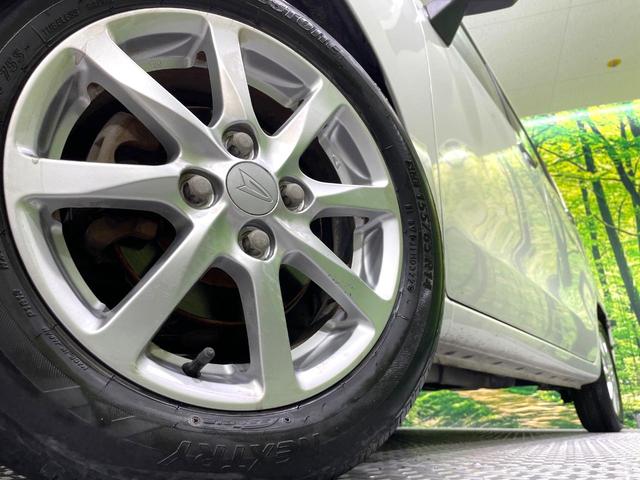 ムーヴ Ｘ　禁煙車　オーディオ　スマートキー　アイドリングストップ　オートエアコン／ライト　純正１４インチアルミ　盗難防止システム　電動格納ミラー　革巻きステアリング　プライバシーガラス（13枚目）