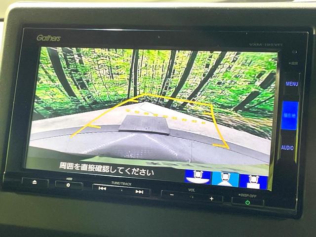 N-BOXカスタム G・Lターボホンダセンシング 禁煙車 両側電動スライド 衝突軽減 純正ナビ アダプティブクルーズ バックカメラ ETC ドラレコ フルセグ スマートキー シートヒーター ハーフレザーシート LEDヘッド/フォグ 革巻きステアリング(4枚目)