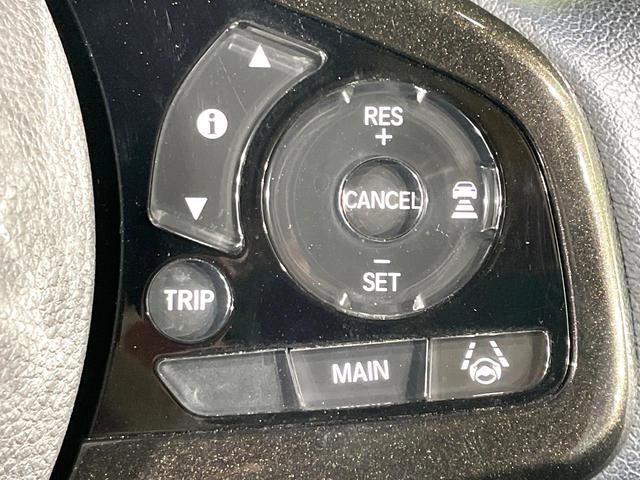 N-BOXカスタム G・Lターボホンダセンシング 禁煙車 両側電動スライド 衝突軽減 純正ナビ アダプティブクルーズ バックカメラ ETC ドラレコ フルセグ スマートキー シートヒーター ハーフレザーシート LEDヘッド/フォグ 革巻きステアリング(7枚目)