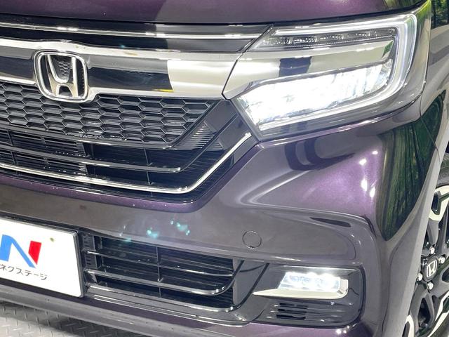 N-BOXカスタム G・Lターボホンダセンシング 禁煙車 両側電動スライド 衝突軽減 純正ナビ アダプティブクルーズ バックカメラ ETC ドラレコ フルセグ スマートキー シートヒーター ハーフレザーシート LEDヘッド/フォグ 革巻きステアリング(14枚目)