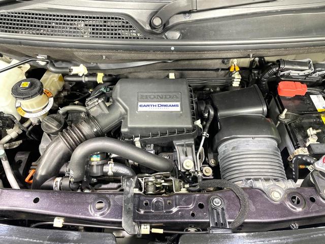 N-BOXカスタム G・Lターボホンダセンシング 禁煙車 両側電動スライド 衝突軽減 純正ナビ アダプティブクルーズ バックカメラ ETC ドラレコ フルセグ スマートキー シートヒーター ハーフレザーシート LEDヘッド/フォグ 革巻きステアリング(18枚目)
