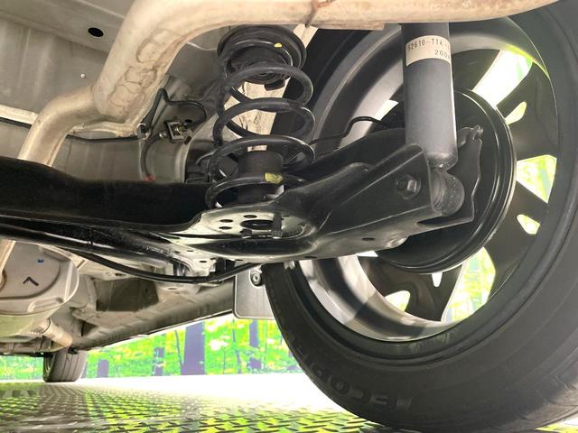 N-BOXカスタム G・Lターボホンダセンシング 禁煙車 両側電動スライド 衝突軽減 純正ナビ アダプティブクルーズ バックカメラ ETC ドラレコ フルセグ スマートキー シートヒーター ハーフレザーシート LEDヘッド/フォグ 革巻きステアリング(21枚目)