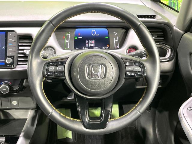 フィット ｅ：ＨＥＶ　ＲＳ　純正９型ナビ　バックカメラ　衝突軽減システム　レーダークルーズコントロール　禁煙車　ドライブレコーダー　ＥＴＣ　Ｂｌｕｅｔｏｏｔｈ再生　フルセグＴＶ　純正１６インチナビ　ＬＥＤヘッドライト（13枚目）