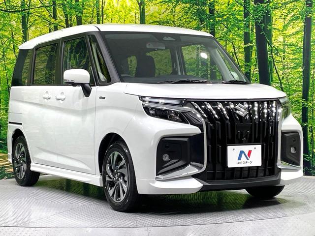 ソリオバンディット ハイブリッドＭＶ　登録済未使用車　純正９型ナビ　全周囲カメラ　両側電動ドア　衝突軽減装置　アダプティブクルーズ　ブラインドスポットモニター　ＬＥＤヘッド／フォグ　シートヒーター　コーナーセンサー　フルセグ（26枚目）