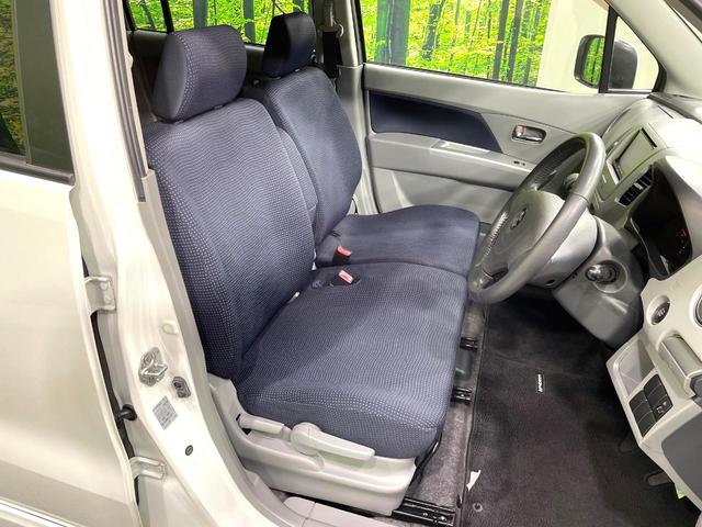 ワゴンＲ ＦＸリミテッドＩＩ　ＳＤナビ　禁煙車　スマートキー　ＥＴＣ　純正１４インチアルミ　盗難防止装置　革巻きステアリング　オートエアコン　地デジ　電動格納ミラー　プライバシーガラス（8枚目）