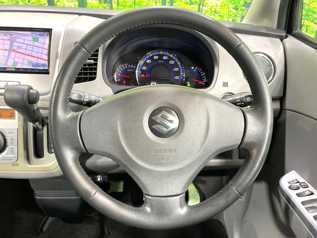 ワゴンＲ ＦＸリミテッドＩＩ　ＳＤナビ　禁煙車　スマートキー　ＥＴＣ　純正１４インチアルミ　盗難防止装置　革巻きステアリング　オートエアコン　地デジ　電動格納ミラー　プライバシーガラス（11枚目）