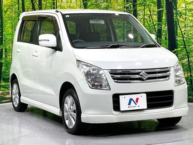 ワゴンＲ ＦＸリミテッドＩＩ　ＳＤナビ　禁煙車　スマートキー　ＥＴＣ　純正１４インチアルミ　盗難防止装置　革巻きステアリング　オートエアコン　地デジ　電動格納ミラー　プライバシーガラス（17枚目）