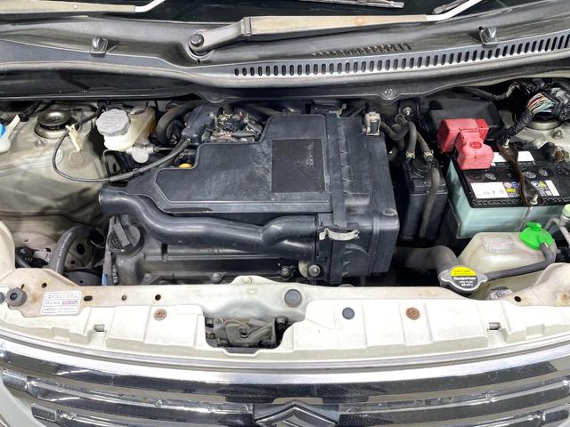 ワゴンＲ ＦＸリミテッドＩＩ　ＳＤナビ　禁煙車　スマートキー　ＥＴＣ　純正１４インチアルミ　盗難防止装置　革巻きステアリング　オートエアコン　地デジ　電動格納ミラー　プライバシーガラス（18枚目）