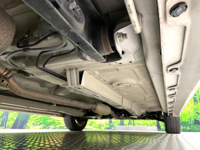 ワゴンＲ ＦＸリミテッドＩＩ　ＳＤナビ　禁煙車　スマートキー　ＥＴＣ　純正１４インチアルミ　盗難防止装置　革巻きステアリング　オートエアコン　地デジ　電動格納ミラー　プライバシーガラス（22枚目）