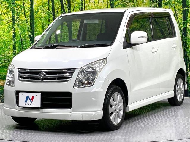 ワゴンＲ ＦＸリミテッドＩＩ　ＳＤナビ　禁煙車　スマートキー　ＥＴＣ　純正１４インチアルミ　盗難防止装置　革巻きステアリング　オートエアコン　地デジ　電動格納ミラー　プライバシーガラス（27枚目）