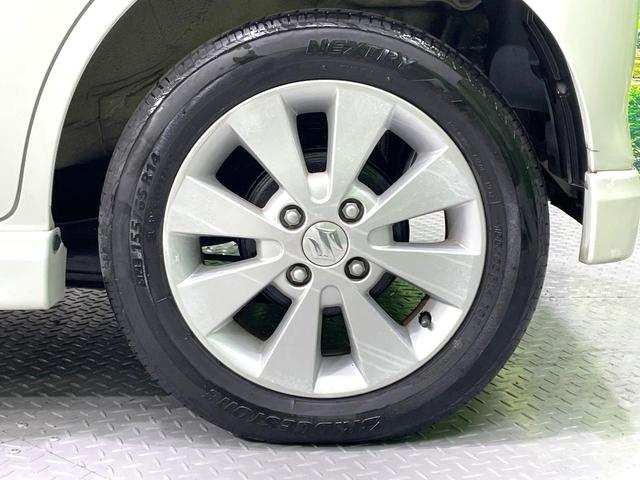 ワゴンＲ ＦＸリミテッドＩＩ　ＳＤナビ　禁煙車　スマートキー　ＥＴＣ　純正１４インチアルミ　盗難防止装置　革巻きステアリング　オートエアコン　地デジ　電動格納ミラー　プライバシーガラス（45枚目）