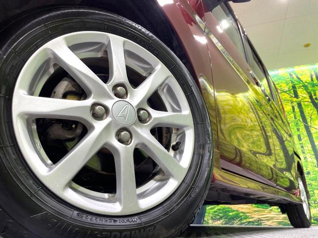 タント カスタムＸ　ＳＡＩＩ　禁煙車　ＳＤナビ　パワースライドドア　衝突軽減装置　踏み間違い防止装置　ＬＥＤヘッド　ＥＴＣ　オートエアコン　アイドリングストップ　スマートキー　純正１４インチアルミ　横滑り防止装置　盗難防止システム（15枚目）