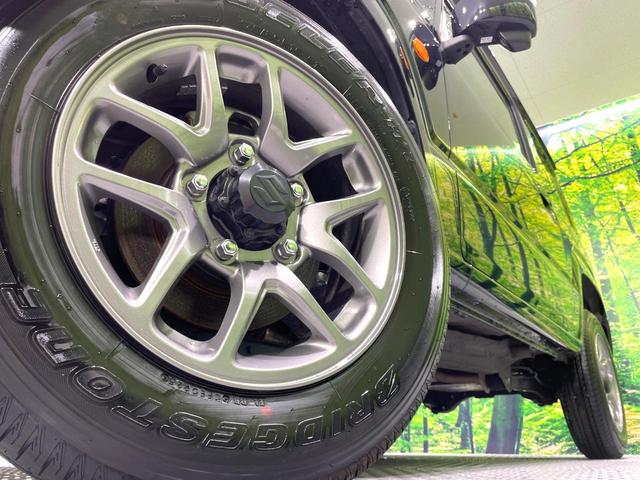 ジムニー ＸＣ　５速ＭＴ　禁煙車　セーフティサポート　クルーズコントロール　スマートキー　踏み間違い防止装置　横滑り防止機能　シートヒーター　ＬＥＤヘッド　４ＷＤ　ターボ　オートライト／エアコン　純正１５インチアルミ（15枚目）