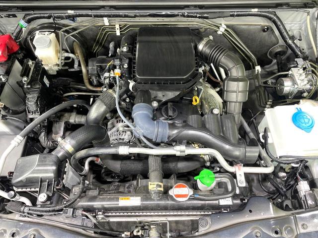 ジムニー ＸＣ　５速ＭＴ　禁煙車　セーフティサポート　クルーズコントロール　スマートキー　踏み間違い防止装置　横滑り防止機能　シートヒーター　ＬＥＤヘッド　４ＷＤ　ターボ　オートライト／エアコン　純正１５インチアルミ（18枚目）