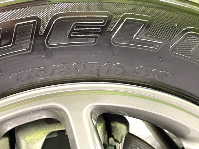 ジムニー ＸＣ　５速ＭＴ　禁煙車　セーフティサポート　クルーズコントロール　スマートキー　踏み間違い防止装置　横滑り防止機能　シートヒーター　ＬＥＤヘッド　４ＷＤ　ターボ　オートライト／エアコン　純正１５インチアルミ（56枚目）