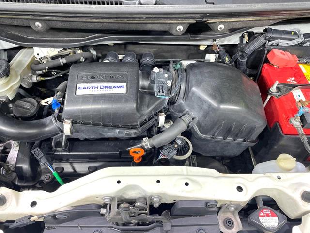 N-BOX G SSパッケージ 禁煙車 両側電動ドア 衝突軽減装置 ETC スマートキー 純正14インチアルミ オートエアコン アイドリングストップ オーディオ 電動格納ミラー 横滑り防止装置 盗難防止システム(18枚目)