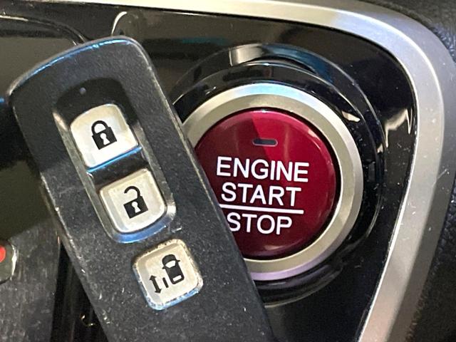 N-BOXカスタム G・Lパッケージ メモリーナビ バックカメラ 禁煙車 パワースライドドア HIDヘッド フルセグ Bluetooth再生 ETC スマートキー 純正14インチアルミ 電動格納ミラー アイドリングストップ オートエアコン(7枚目)