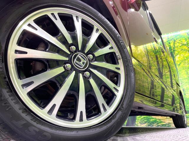 Ｎ－ＢＯＸカスタム Ｇ・ターボＬパッケージ　純正８型ナビ　バックカメラ　禁煙車　両側電動ドア　クルコン　スマートキー　ＨＩＤヘッド　ハーフレザー　フルセグ　Ｂｌｕｅｔｏｏｔｈ再生　ＥＴＣ　純正１５インチアルミ　オートライト／エアコン（13枚目）