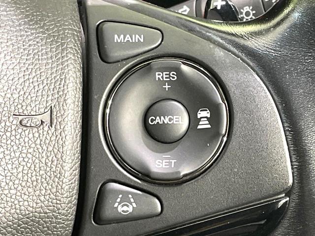 ヴェゼル ハイブリッドＲＳ・ホンダセンシング　純正ナビ　バックカメラ　禁煙車　ホンダセンシング　レーダークルーズコントロール　ＥＴＣ　シートヒーター　Ｂｌｕｅｔｏｏｔｈ再生　フルセグＴＶ　ＬＥＤヘッド／フロントフォグライト　スマートキー（9枚目）