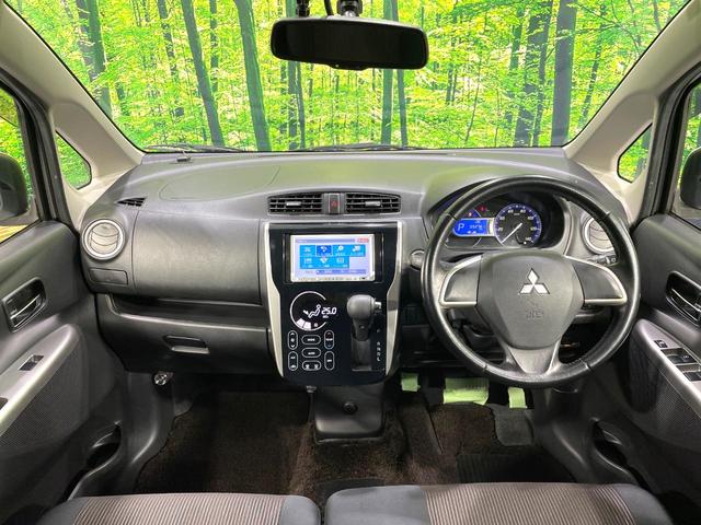 ｅＫカスタム Ｔ　ターボ　ｃｌａｒｉｏｎナビ　バックカメラ　禁煙車　ＥＴＣ　スマートキー　ＨＩＤヘッドライト　オートライト　オートエアコン　純正１４インチＡＷ　ＣＤ／ＤＶＤ再生（2枚目）