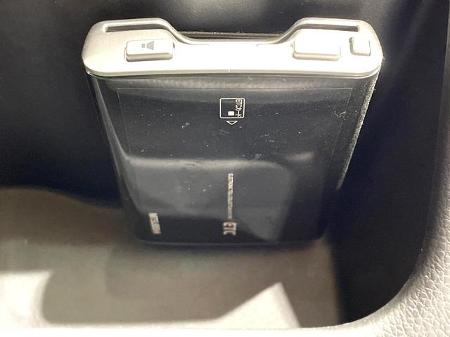 ｅＫカスタム Ｔ　ターボ　ｃｌａｒｉｏｎナビ　バックカメラ　禁煙車　ＥＴＣ　スマートキー　ＨＩＤヘッドライト　オートライト　オートエアコン　純正１４インチＡＷ　ＣＤ／ＤＶＤ再生（5枚目）