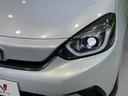 ｅ：ＨＥＶホーム　禁煙車　純正９型ナビ　ホンダセンシング　アダプティブクルーズコントロール　ＬＥＤヘッドライト　バックカメラ　オートエアコン　ＥＴＣ　ドライブレコーダー　Ｂｌｕｅｔｏｏｔｈ　パーキングセンサーシステム（12枚目）