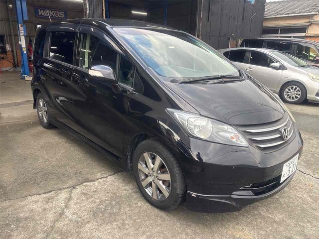 フリード Ｇ　エアロ　ジャストセレクション　ドライブレコーダー　ＥＴＣ　バックカメラ　ナビ　ＴＶ　両側スライド・片側電動　オートライト　スマートキー　電動格納ミラー　３列シート　ウォークスルー　ＣＶＴ　アルミホイール　記録簿　盗難防止システム（3枚目）